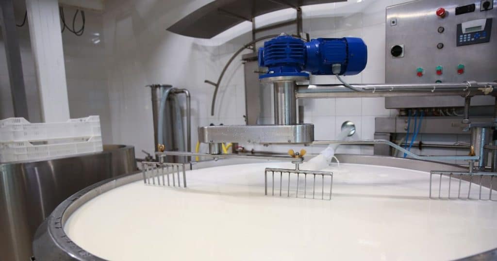 Ingredient mixing machine in a food processing plant